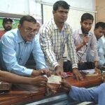 দুর্গাপুরে বন্যার্তদের মাঝে নগদ অর্থ ও টিন বিতরণ