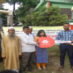 ফুলবাড়ীতে ধান কাটাই মাড়াই হারভেস্টার মেশিন কৃষকের মাঝে বিতরণ ॥