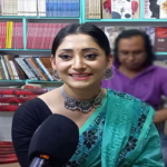 আব্দুল আজিজের বইয়ের প্রচারে বইমেলায় পূজা চেরী