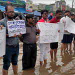 আশুলিয়ায় জলাবদ্ধতা নিরসনের দাবিতে মানববন্ধন