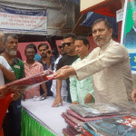 নওগাঁয় শারদীয় দূর্গোৎসব উপলক্ষে শাড়ি  বিতরণ