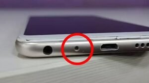 স্মার্টফোনের চার্জিং পোর্টের পাশে এই ছোট্ট ছিদ্রর কাজ কী