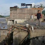 নতুন বন্যার আশঙ্কায় উদ্ধার অভিযান স্থগিত করল চীন